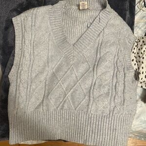 Light blue sweater vest, adorable with jeans, classy